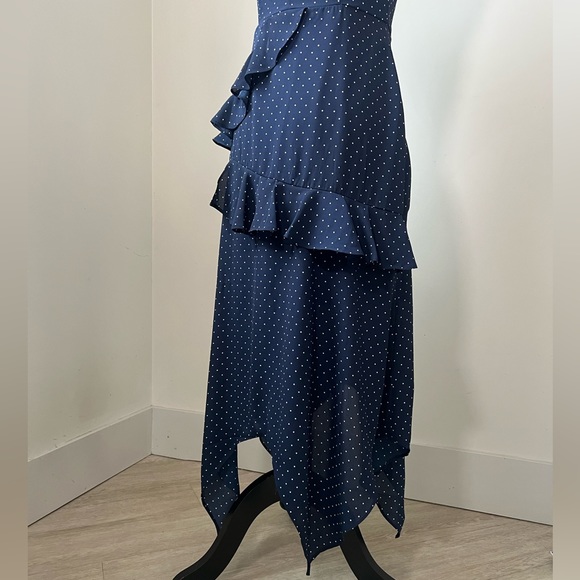 Perfect for the country club! This polka dot ruffled dress is all class. - Picture 5 of 5